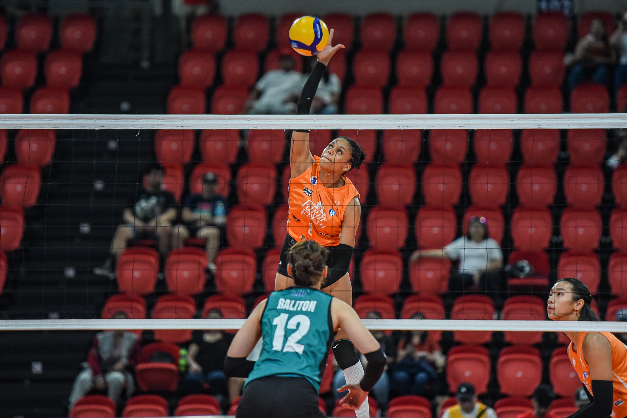 YENY Murillo of Farm Fresh attacks the defense of Galeries Tower during their PVL Reinforced Conference match yesterday at the Philsports Arena in Pasig City. The Foxies prevailed, 25-22, 35-37, 23-25, 25-20, 15-10.
